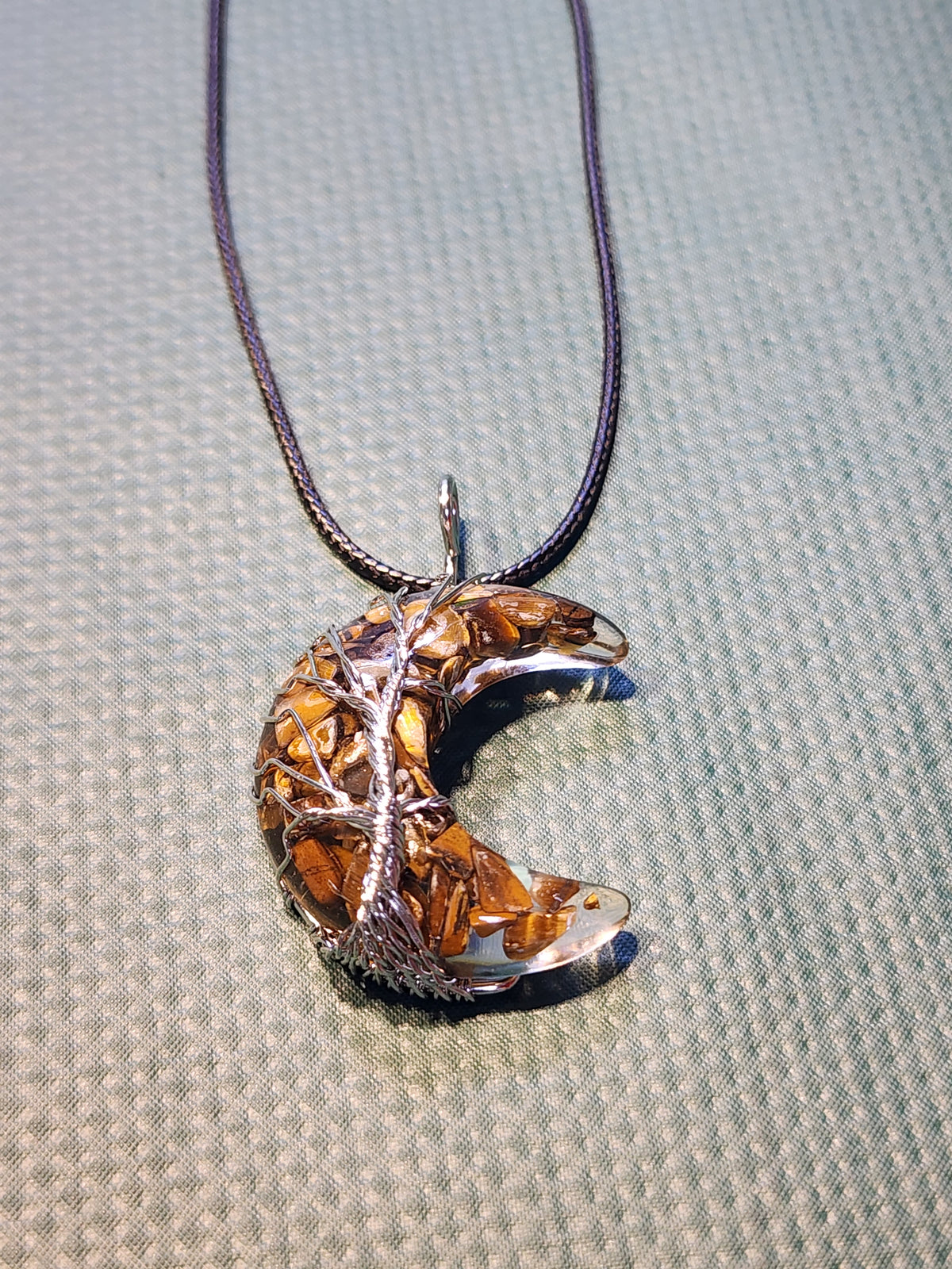 Moon shaped with tree of life design necklace