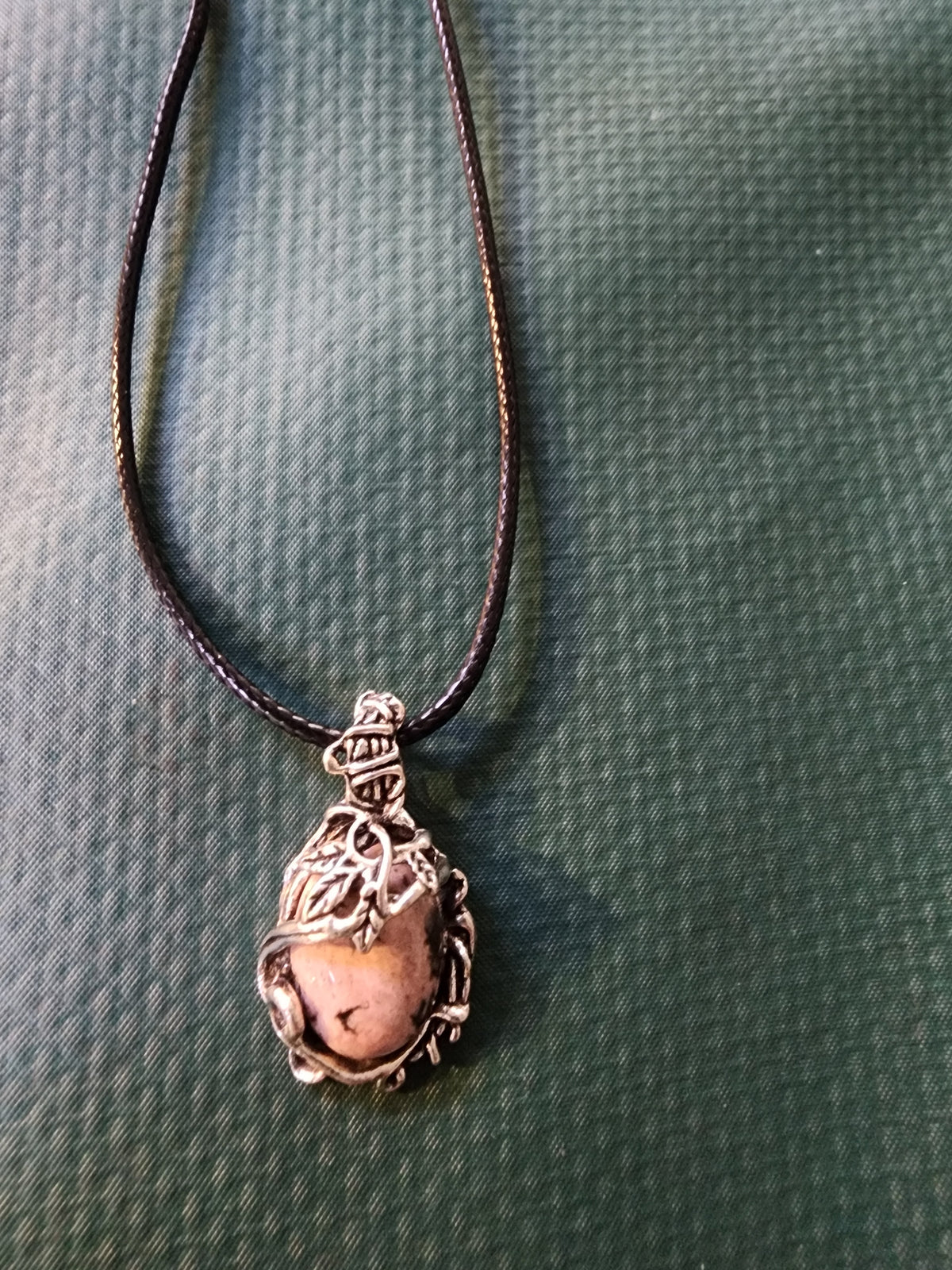 Stone pendant with beautiful silver outerlay