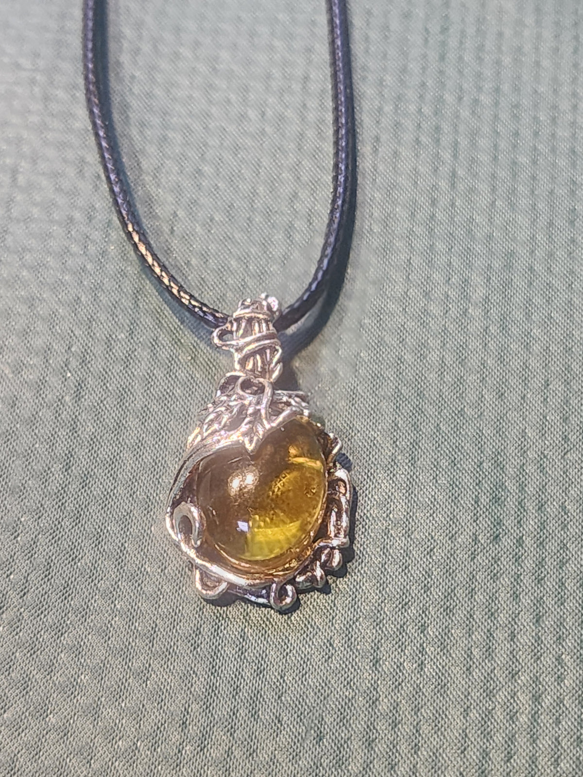 Stone pendant with beautiful silver outerlay