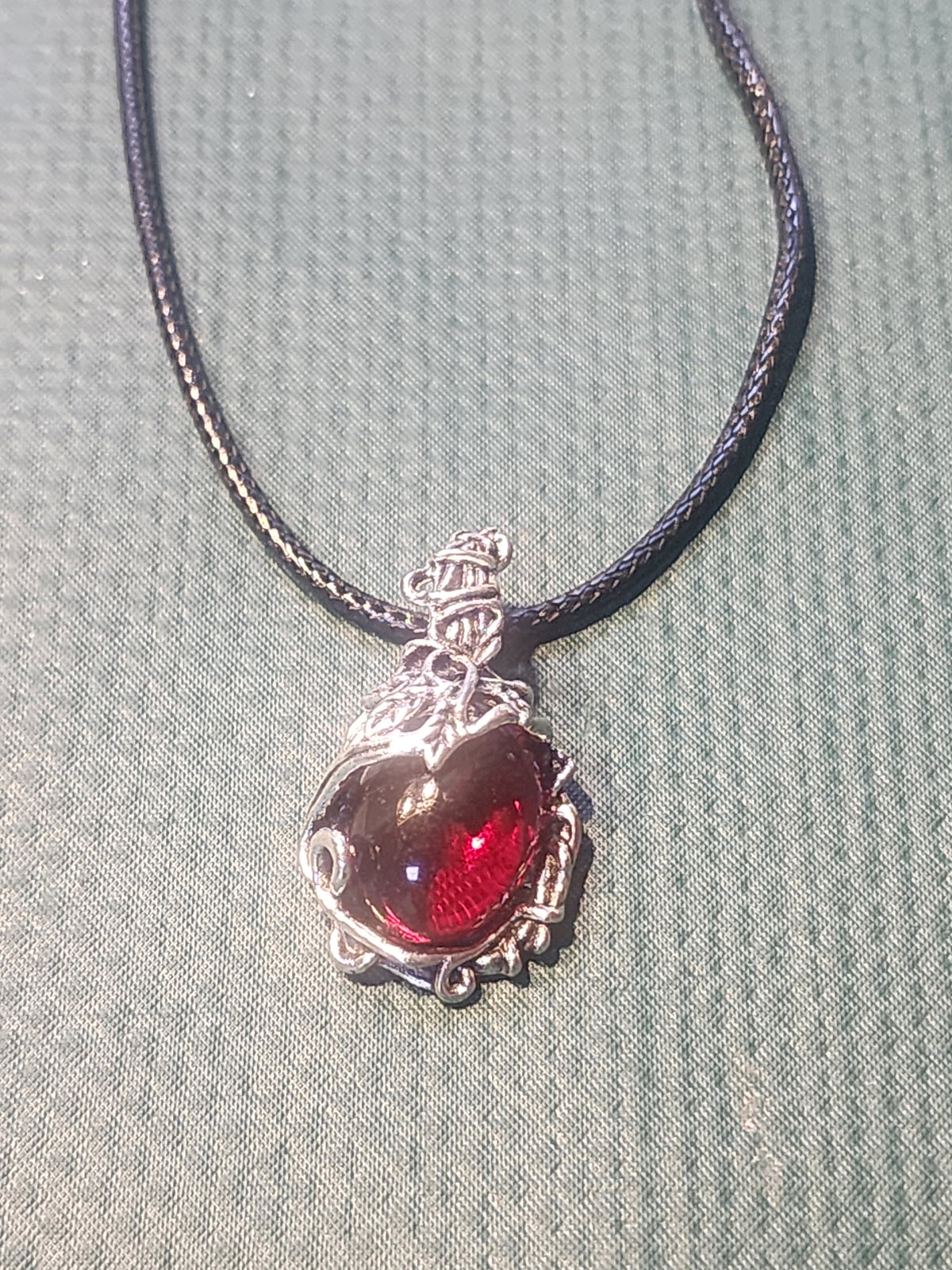 Stone pendant with beautiful silver outerlay