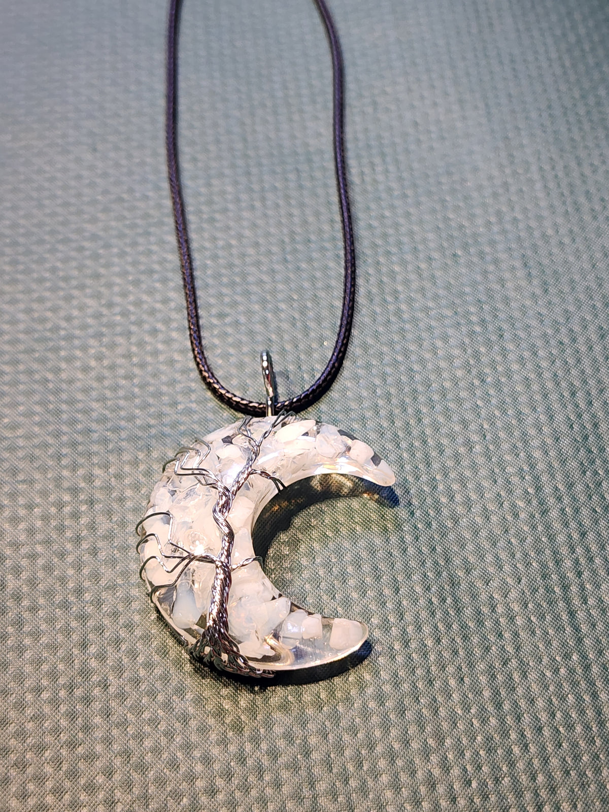 Moon shaped with tree of life design necklace
