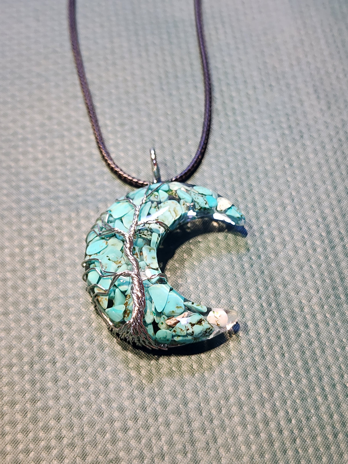 Moon shaped with tree of life design necklace